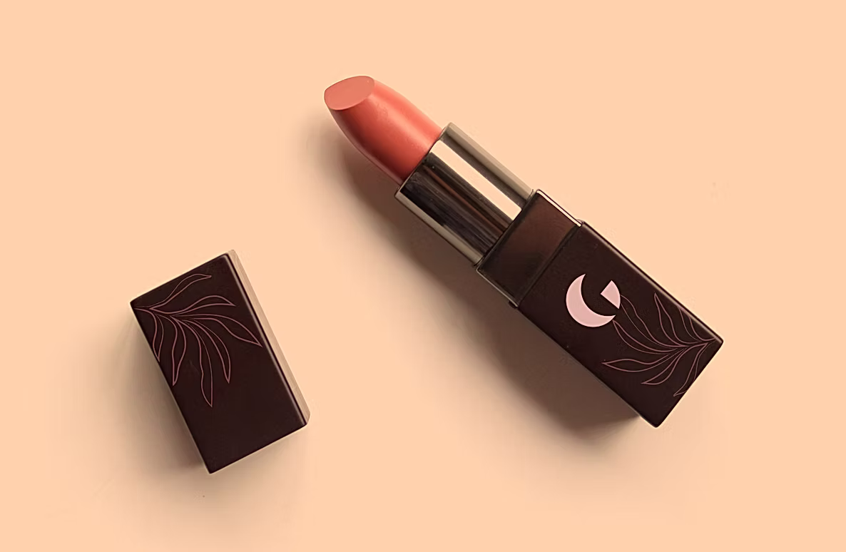 Gabriella's lipstick and its case with a leaf pattern