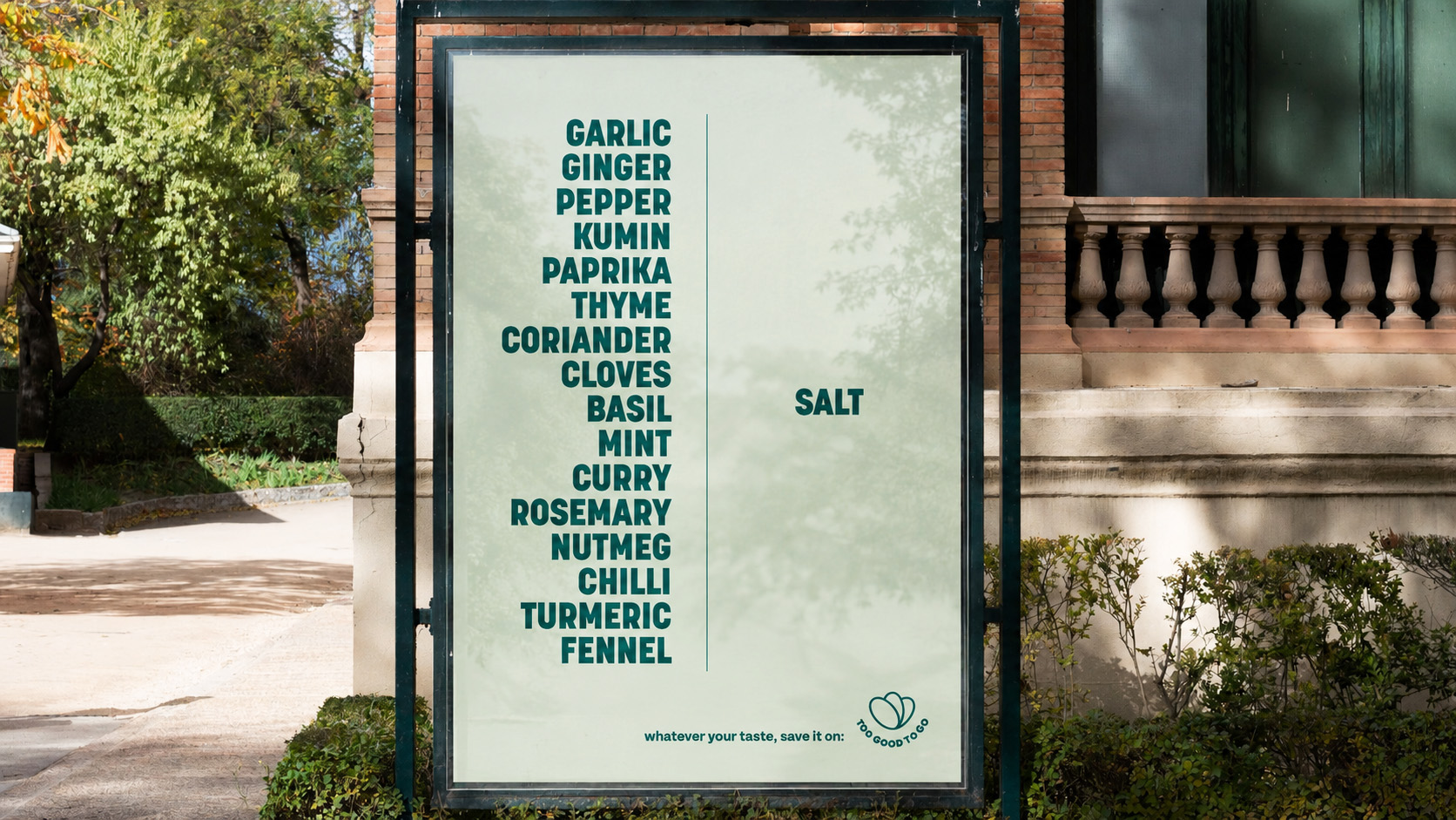 A framed street poster listing spices - garlic, ginger, pepper, cumin and more - beside the word ‘Salt’