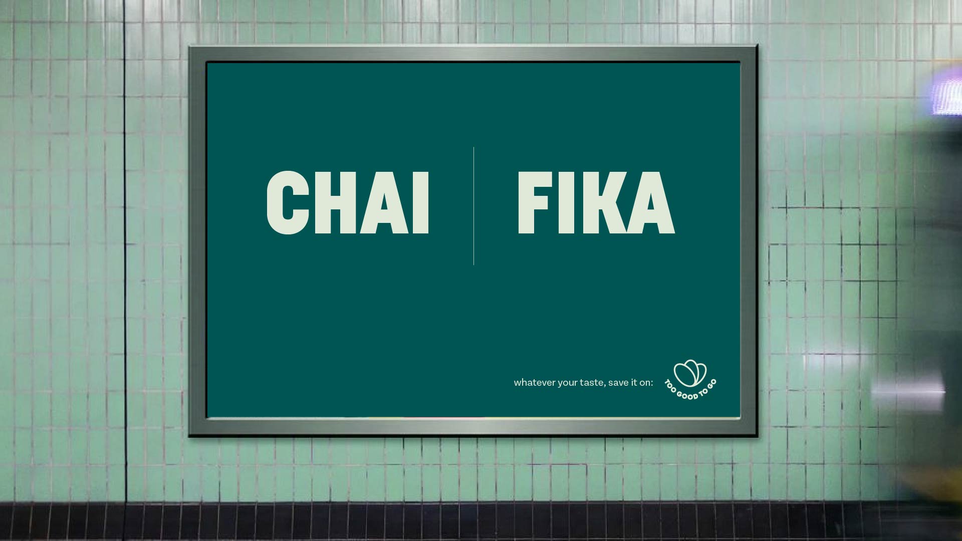A tiled-wall poster reading ‘Chai’ and ‘Fika’ side by side