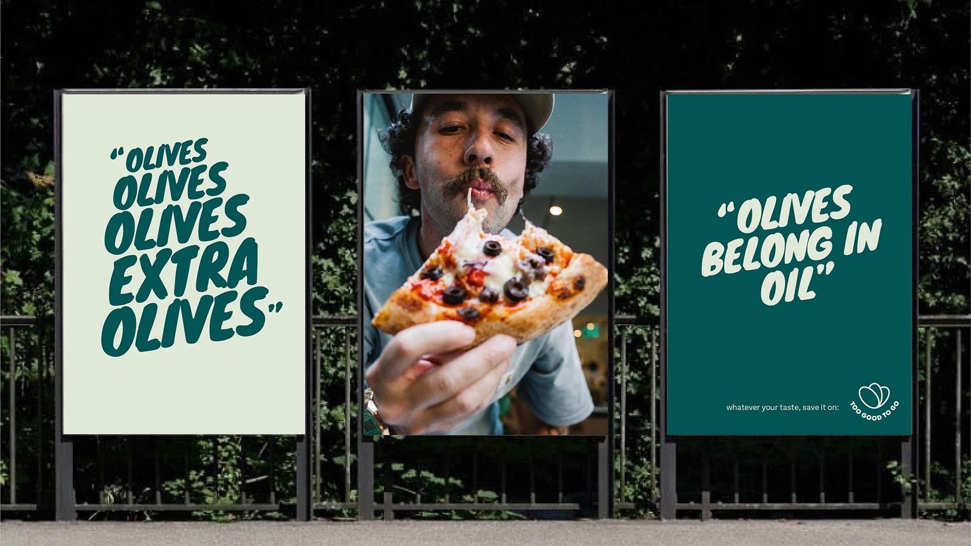 Animated bus-shelter posters cycling between an ‘Olives’ debate and a ‘Pineapple’ pizza debate
