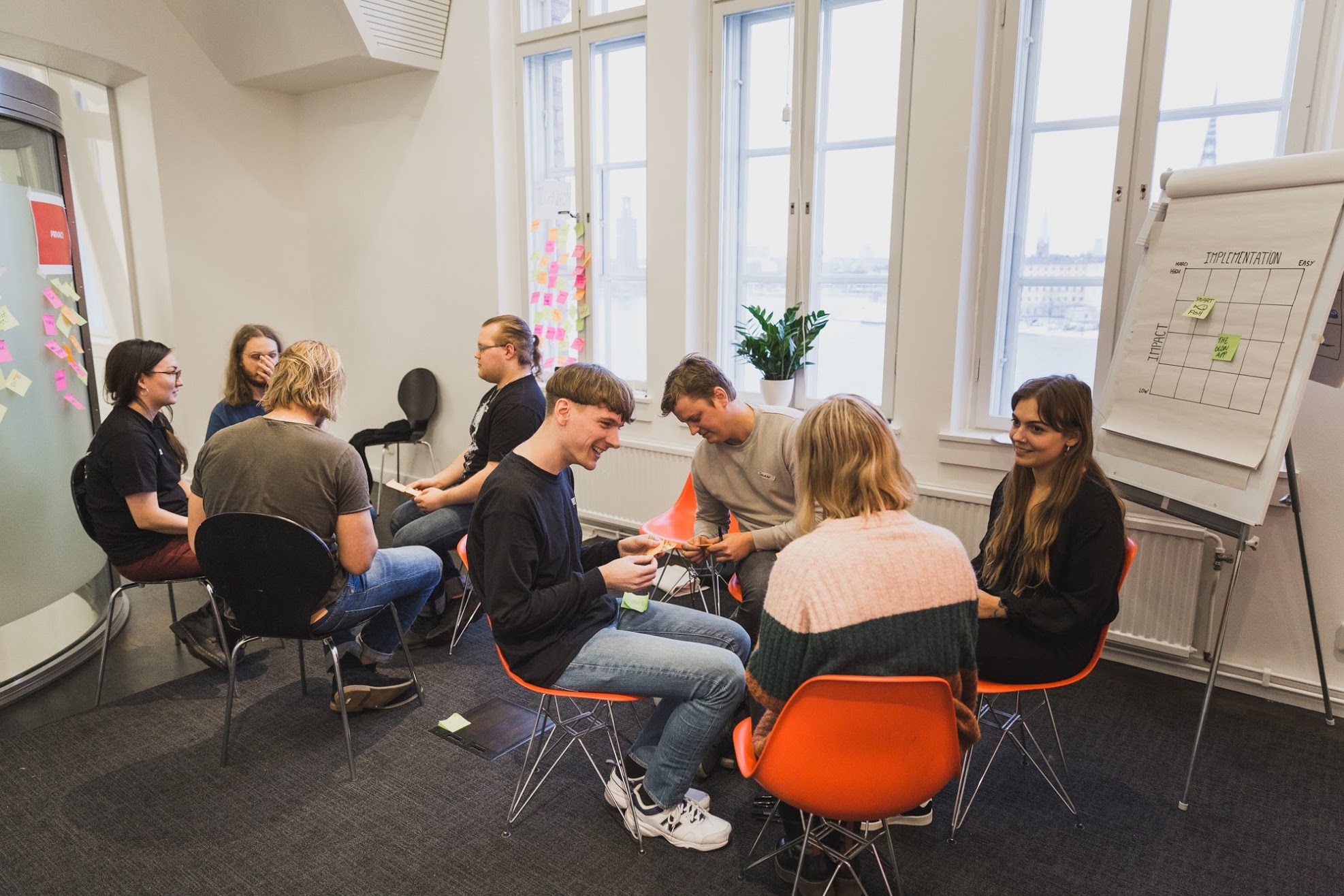 Record Union team sitting in a circle during a workshop